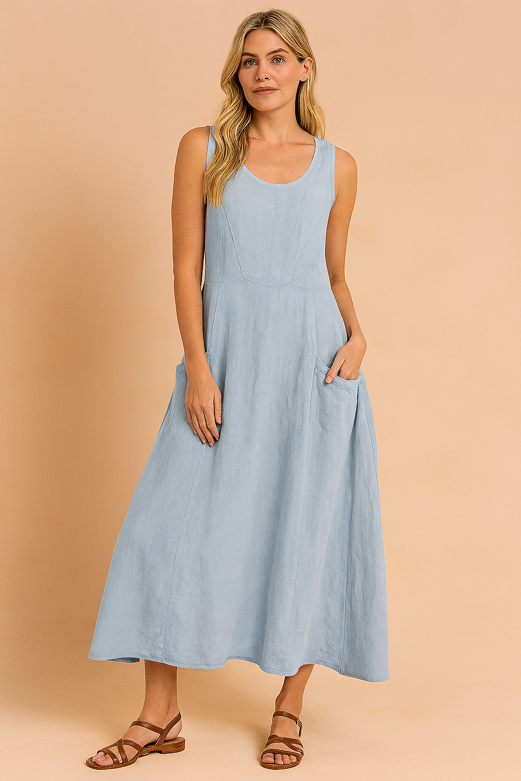 Luźna sukienka damska maxi z kieszeniami, w modnym stylu oversize. Idealna na wiele okazji.