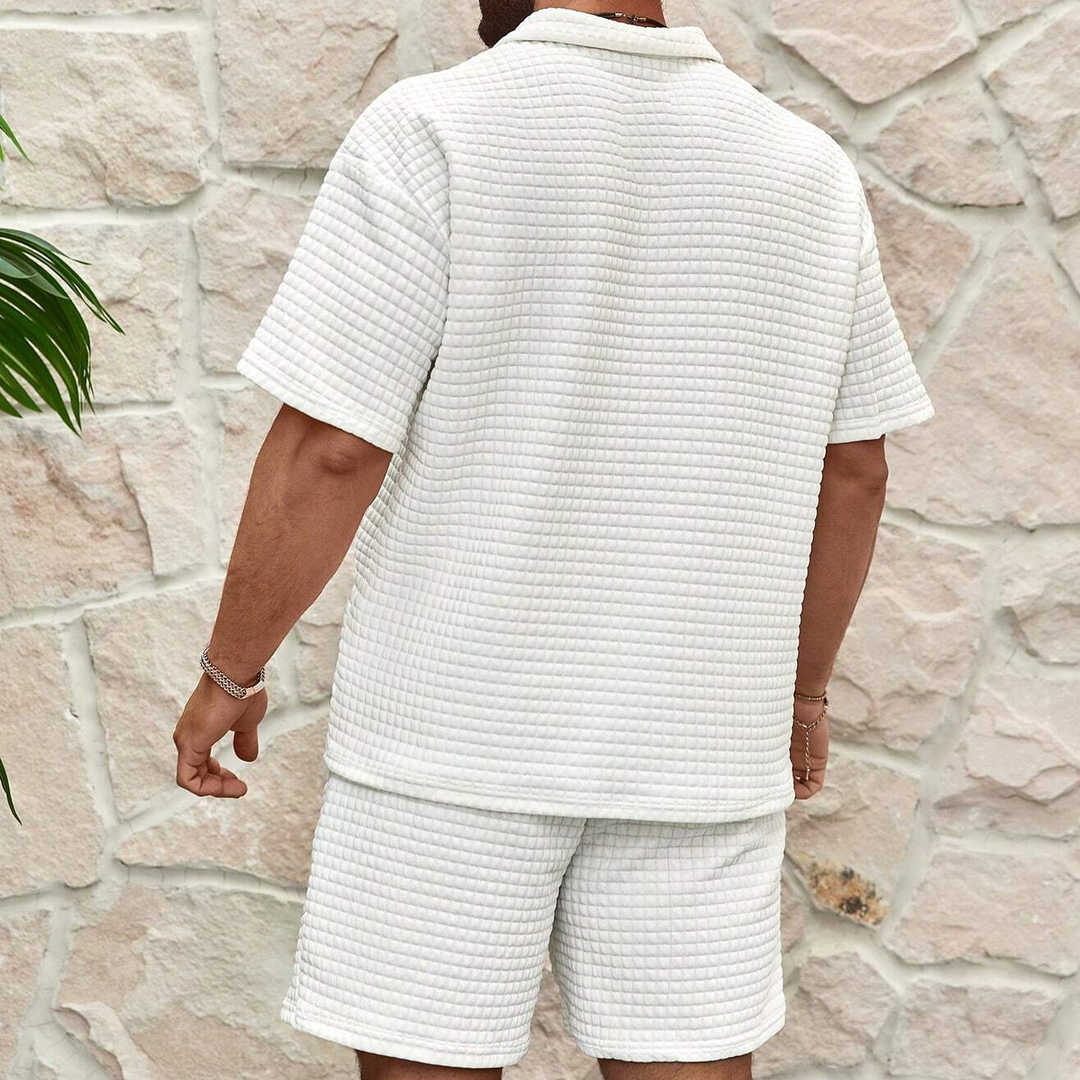 Komplet męski letni z luźnym krojem: koszulka i szorty z waflowej tkaniny, komfortowy lounge wear na upały.