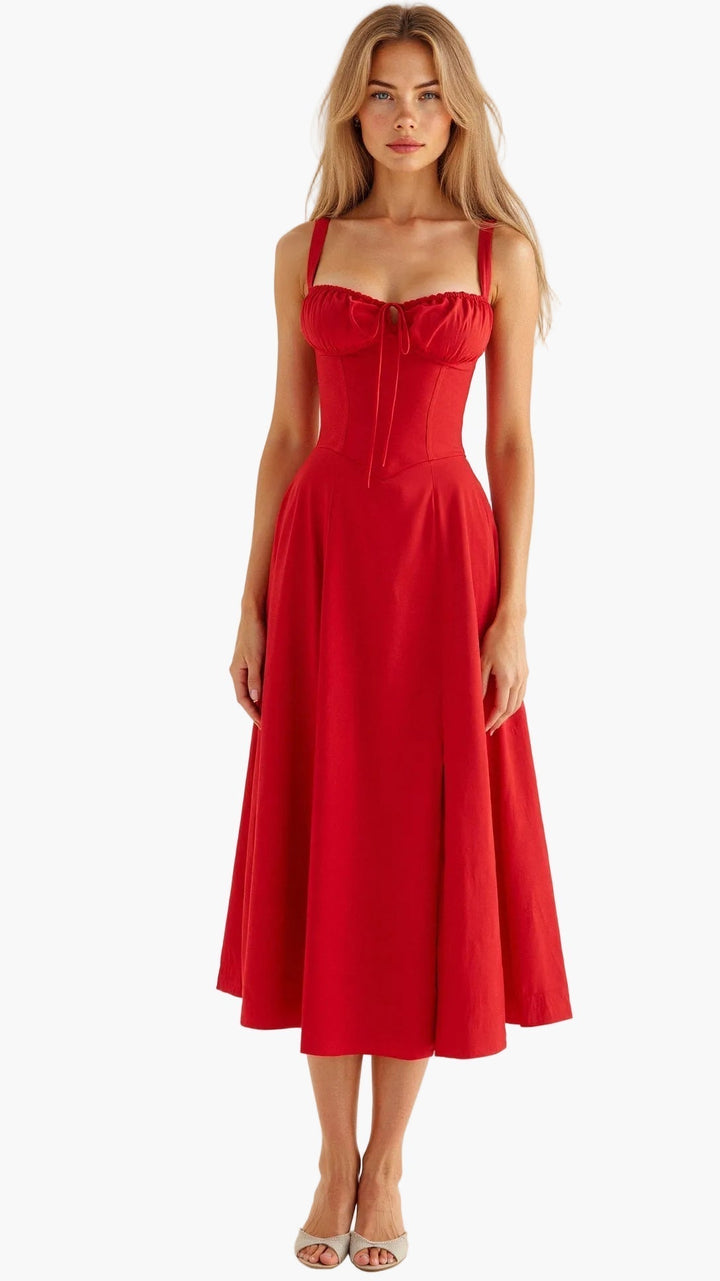 Elegancka sukienka midi z rozcięciem i gorsetową górą, must-have w letniej garderobie.