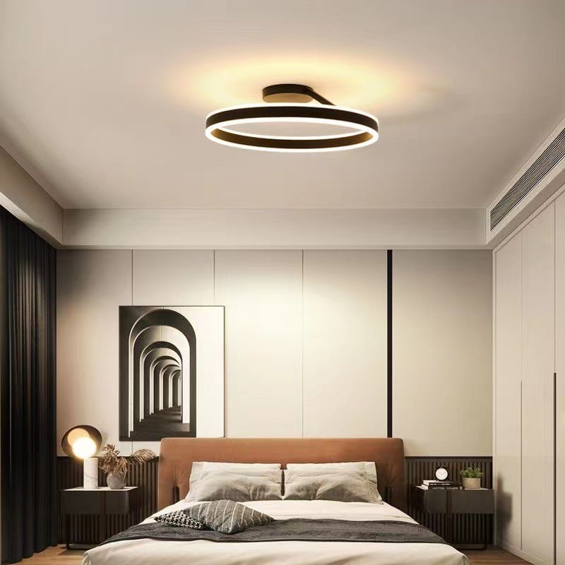 Minimalistyczna lampa sufitowa Luminara, czarna LED, idealna do nowoczesnych wnętrz.