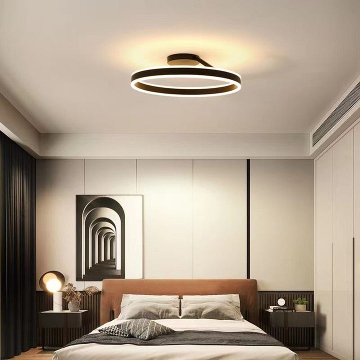 Minimalistyczna lampa sufitowa Luminara, czarna LED, idealna do nowoczesnych wnętrz.