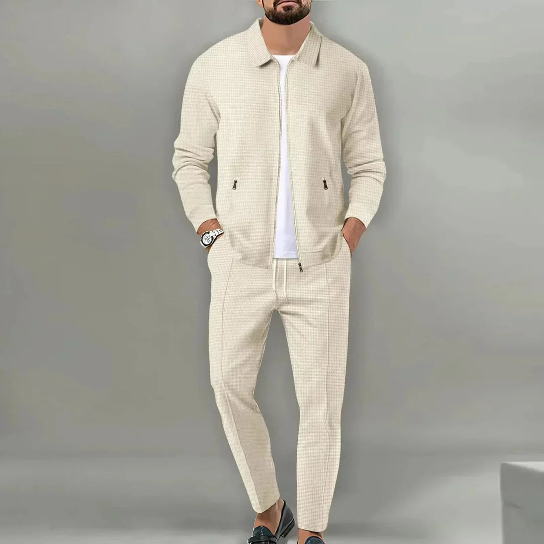 Kompletny męski garnitur slim fit dwuczęściowy. Nowoczesny krój, odzież formalna dla modnego mężczyzny.