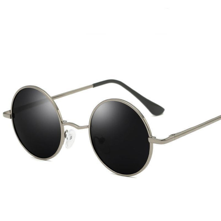 Eleganckie męskie okrągłe okulary przeciwsłoneczne. Mocne przyciemnienie zapewnia ochronę oczu i letni styl.
