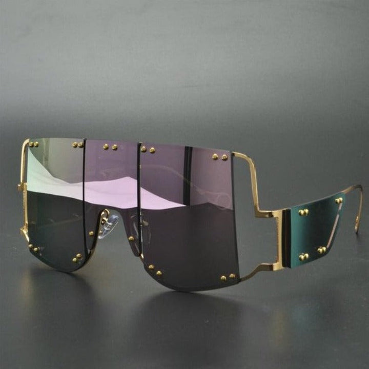 Stylowe okulary przeciwsłoneczne damskie, prostokątne. Futurystyczny look, idealne do letnich stylizacji.