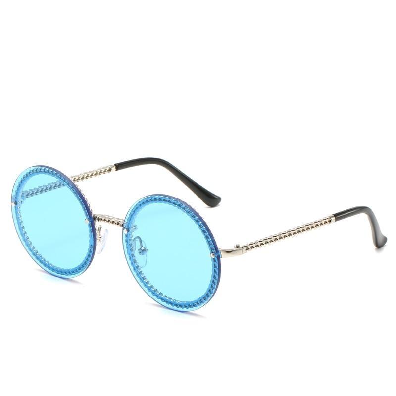 Stylowe okrągłe okulary przeciwsłoneczne damskie, modne akcesoria eyewear. Zapewniają ochronę UV.