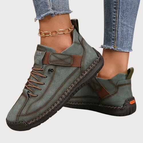 Damskie buty sportowe zapewniające wsparcie i amortyzację dla aktywnych stóp.