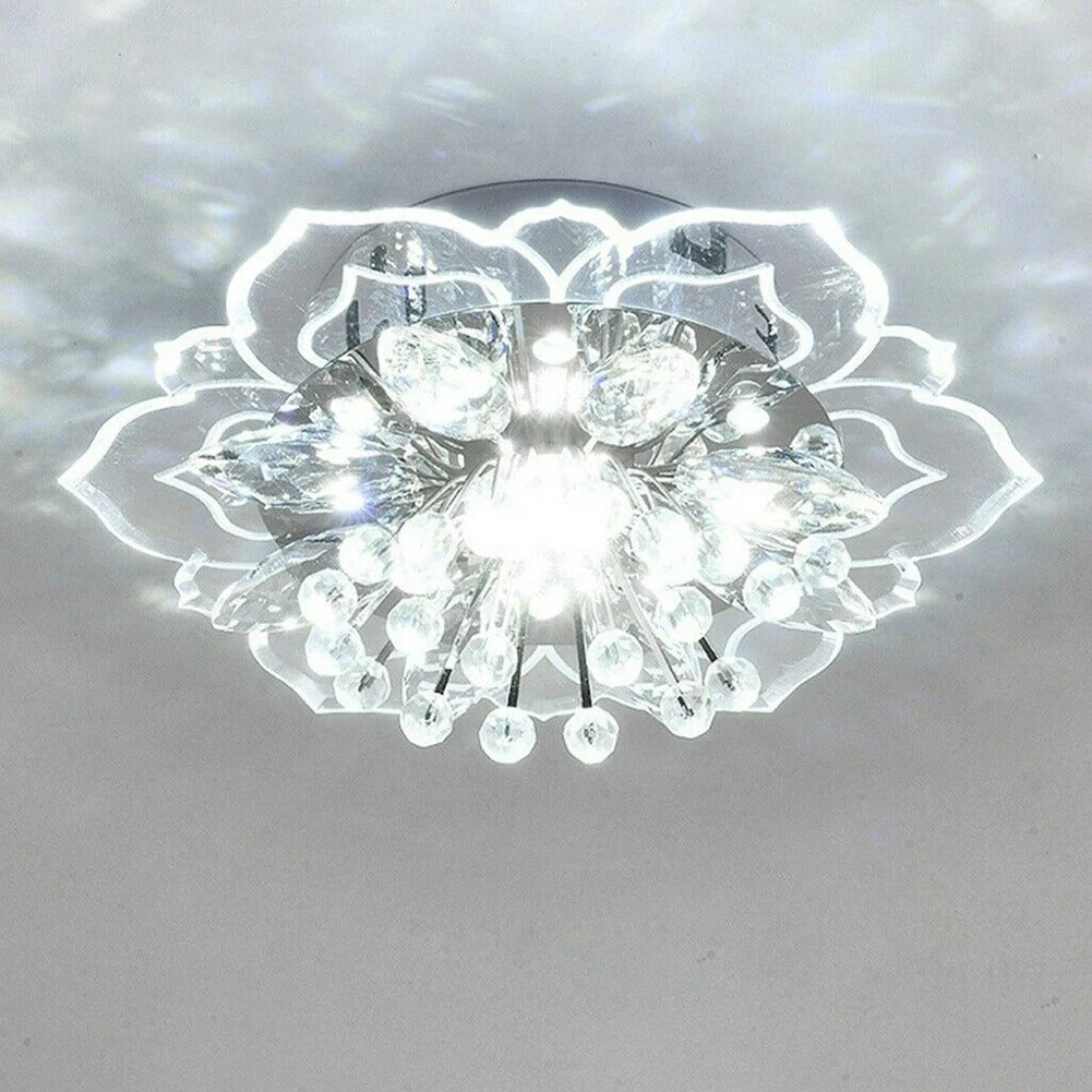 Designerska lampa sufitowa LED z kryształami w kształcie kwiatu. Idealna ozdoba do jadalni, elegancki akcent.