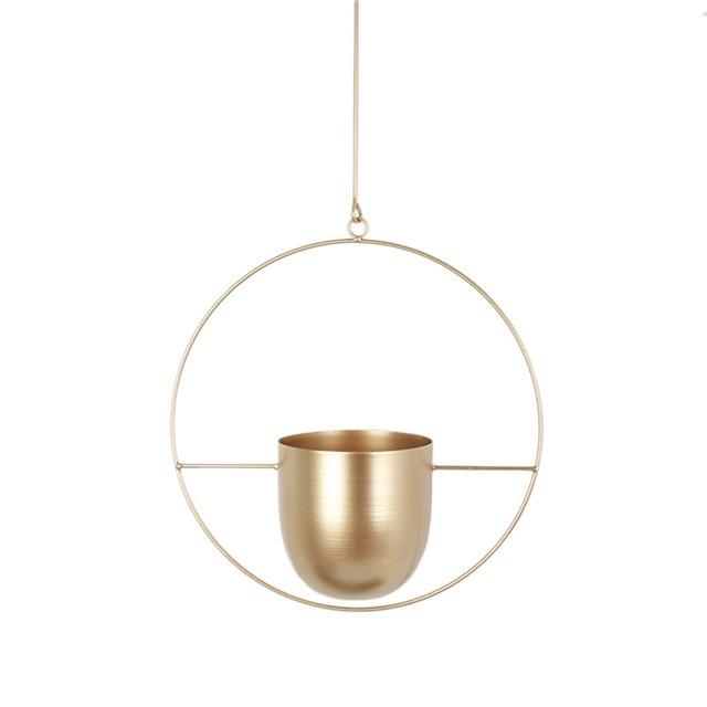 Elegancki minimalistyczny wieszak ścienny na doniczki. Metalowy design podnosi estetykę wnętrz.
