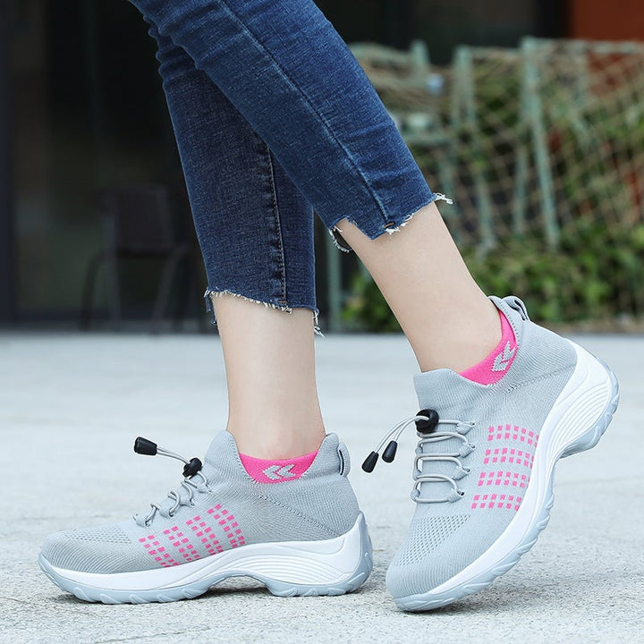 Stylowe sneakersy Theresa dla kobiet, na grubej platformie, idealne do modnych casualowych stylizacji.
