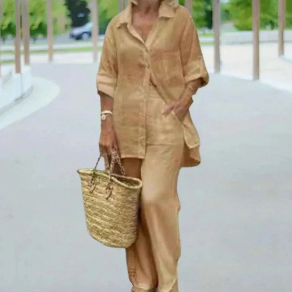 Elegancki damski zestaw lniany oversize: luźna bluzka i spodnie. Modny, przewiewny strój na lato.