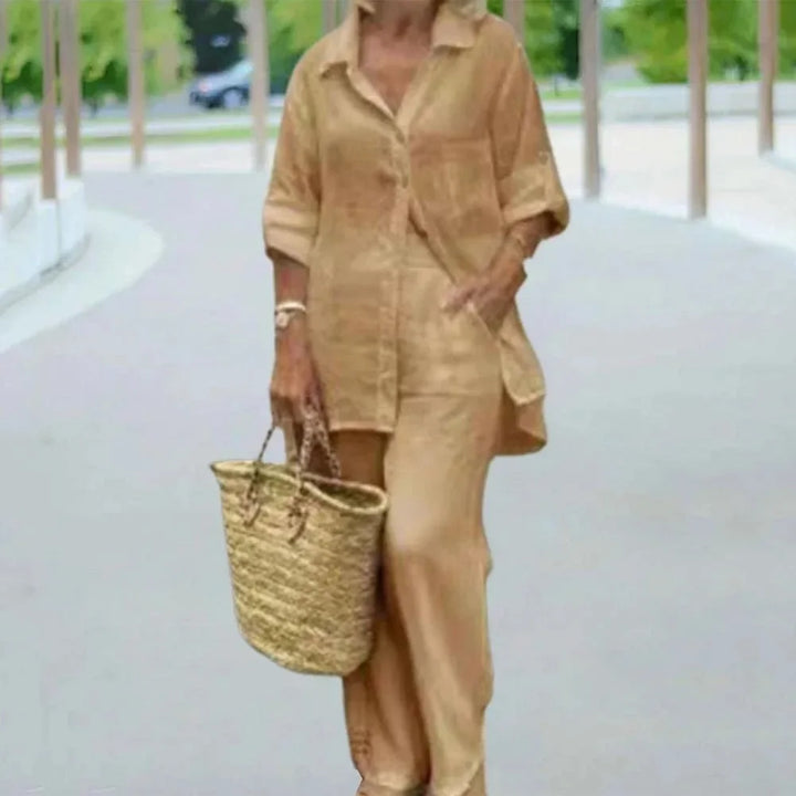 Elegancki damski zestaw lniany oversize: luźna bluzka i spodnie. Modny, przewiewny strój na lato.
