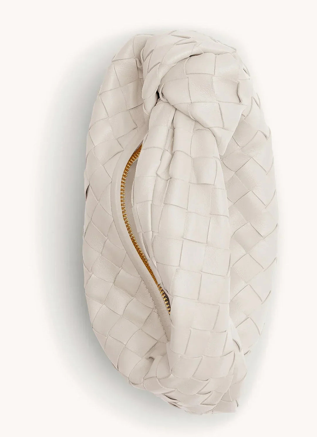 Tył torebki damskiej z dyskretną kieszonką, podkreślający minimalistyczny styl. Praktyczna i elegancka.