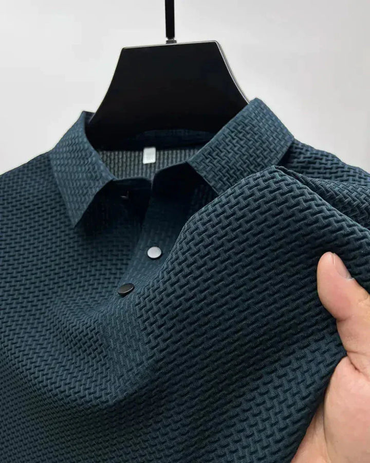 Elegancka męska koszulka polo w modnym odcieniu szarości. Idealna na spotkania biznesowe, randki i casualowe wyjścia.