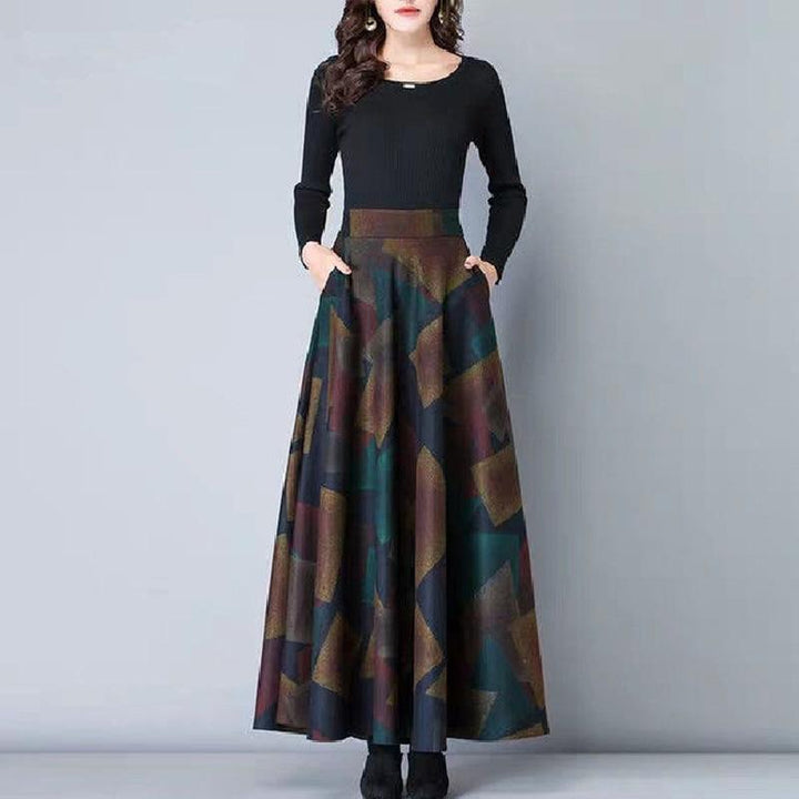 Damska spódnica maxi w stylu vintage, rozkloszowana z pięknymi wzorami, zapewniająca komfort i swobodę.