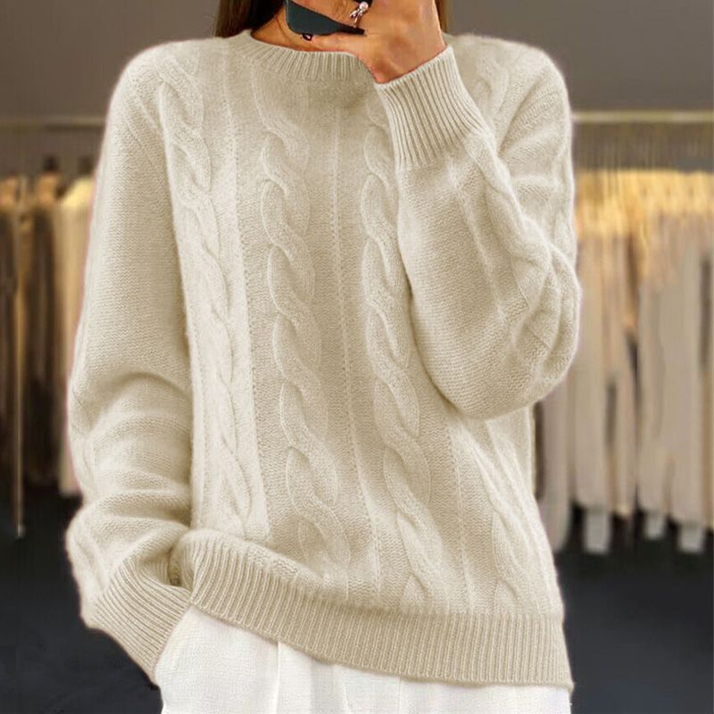 Elegancki wiosenny sweter damski z dzianiny, klasyczny fason. Idealny na co dzień.
