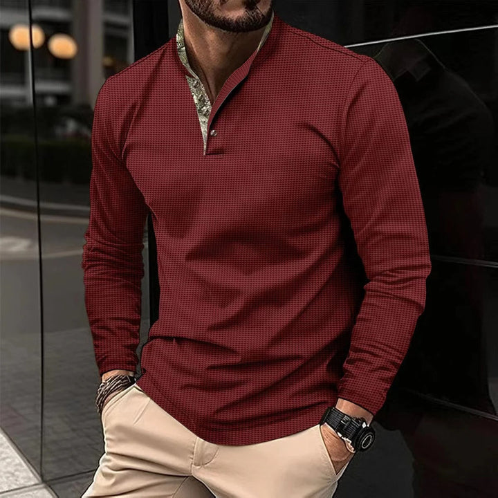Komfortowa męska polo longsleeve Finn z oddychającego materiału, modna i wielosezonowa odzież.
