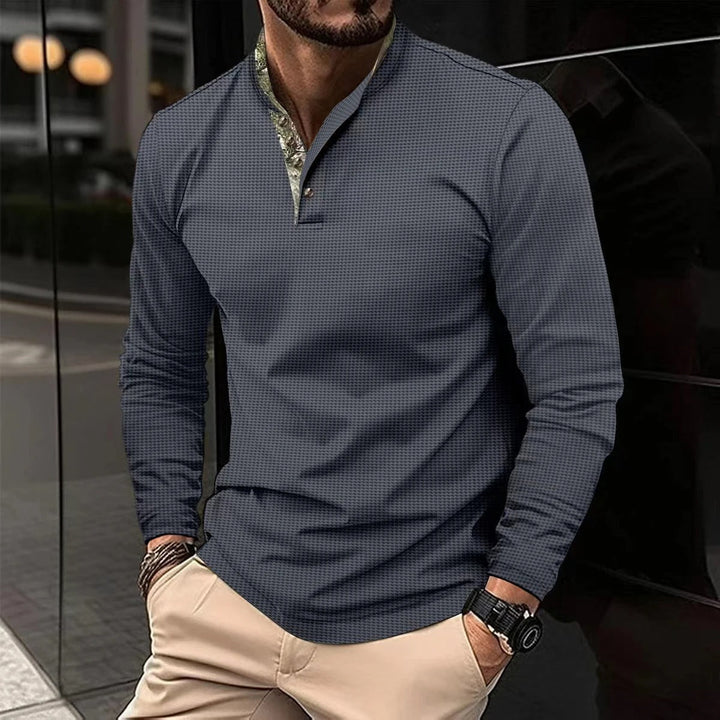 Wielosezonowa męska koszulka polo longsleeve Finn, komfortowa odzież o eleganckim, casualowym stylu.