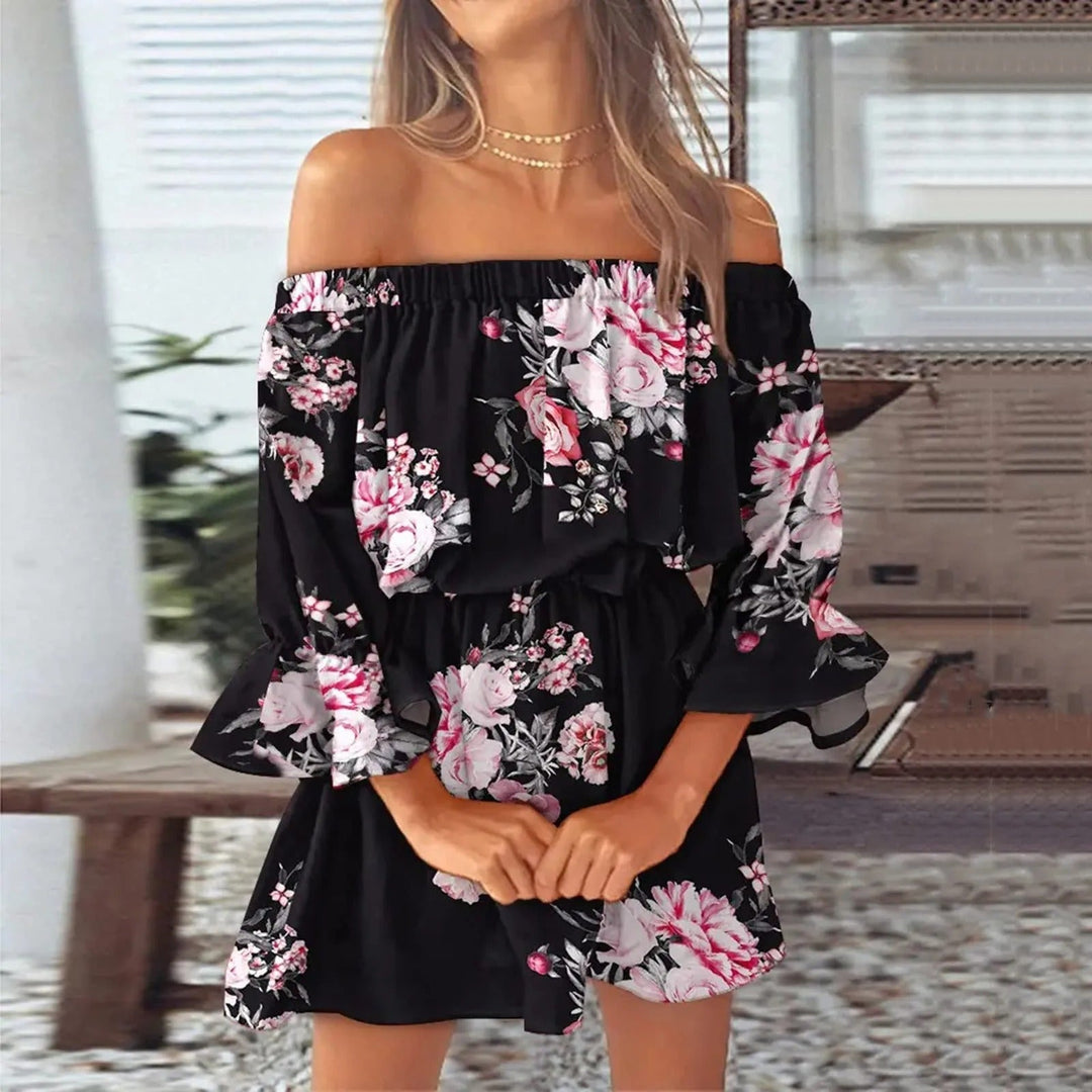 Elegancka sukienka letnia w kwiaty, z rozszerzanymi rękawami. Styl boho, idealna na casualowe i wizytowe okazje.