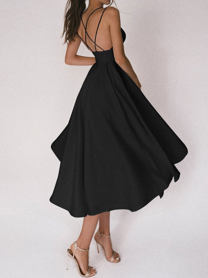 Elegancka sukienka midi V-neck Noa, bez rękawów, idealna na wieczorne wyjście.