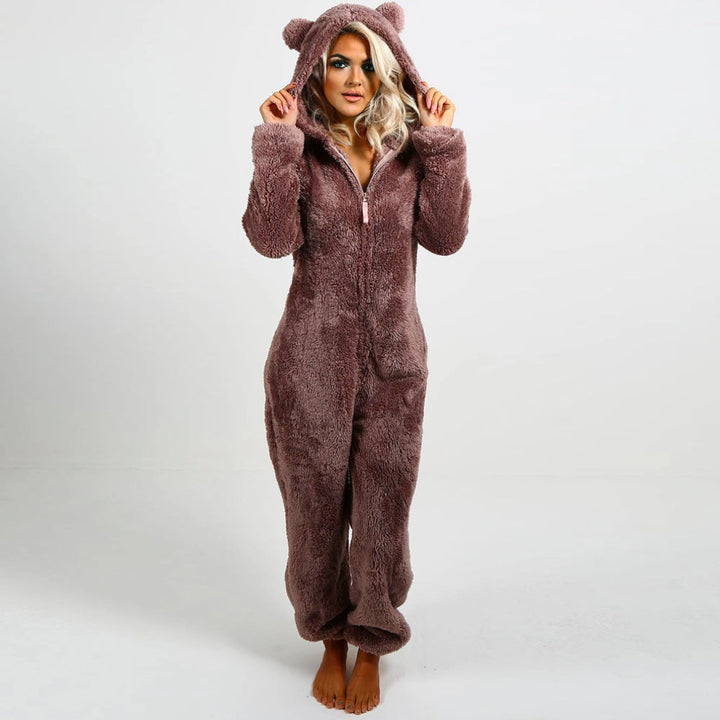 Damski kombinezon polarowy kigurumi misia, ciepły i miękki, idealny do spania lub relaksu.