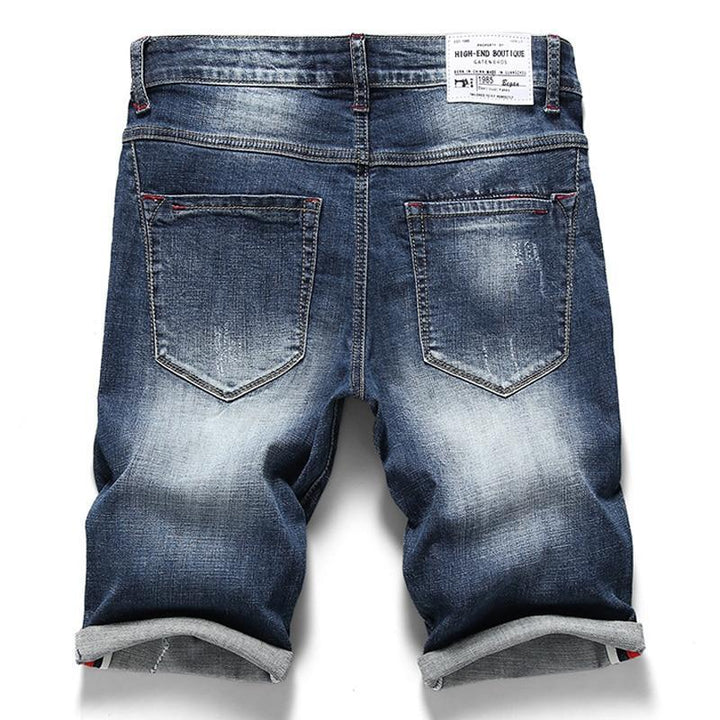 Modne szorty męskie slim fit w kolorze niebieskim, doskonałe na casualowe wyjścia letnie.