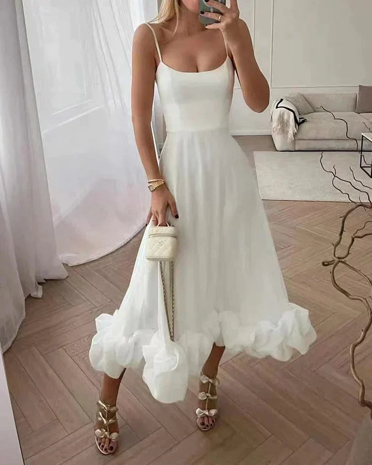 Stylowa sukienka midi damska Sophia z lejącego materiału, perfekcyjna na przyjęcie. Modna odzież.
