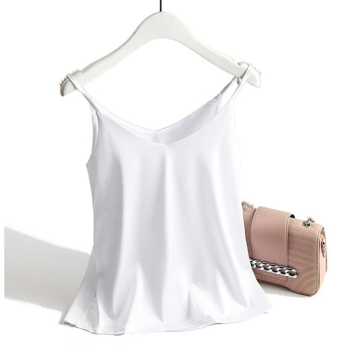 Letni damski tank top, luźny krój. Idealny do casualowych i eleganckich stylizacji na lato.