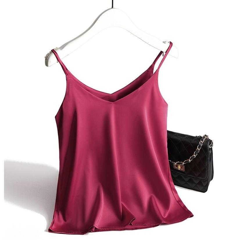 Biały damski tank top, elegancki i lekki. Komfortowy top z dekoltem V, idealny na lato.