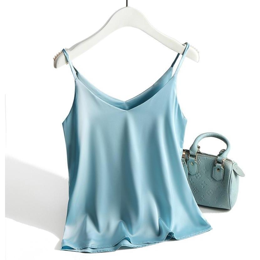 Elegancki damski tank top z dekoltem V, luźny i komfortowy. Modny na upalne lato.