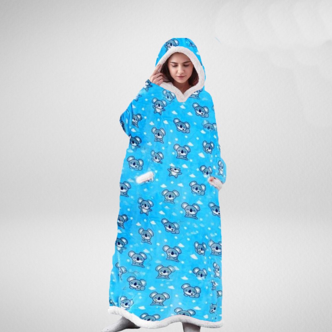 Koc z kapturem oversize do relaksu w domu, idealny na długie wieczory. Ciepły i przytulny koc unisex.