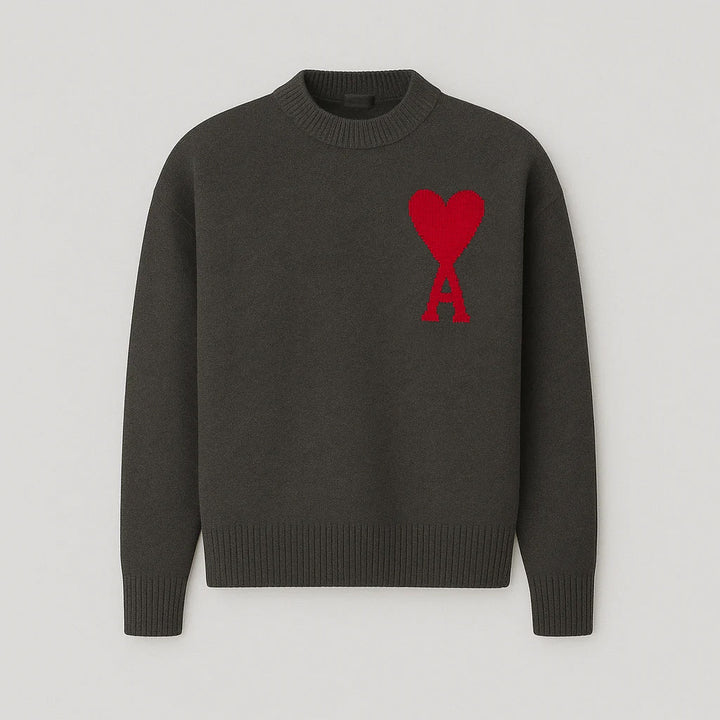 Stylowy sweter oversize z uroczym wzorem serca, idealny do jeansów i spódnic.