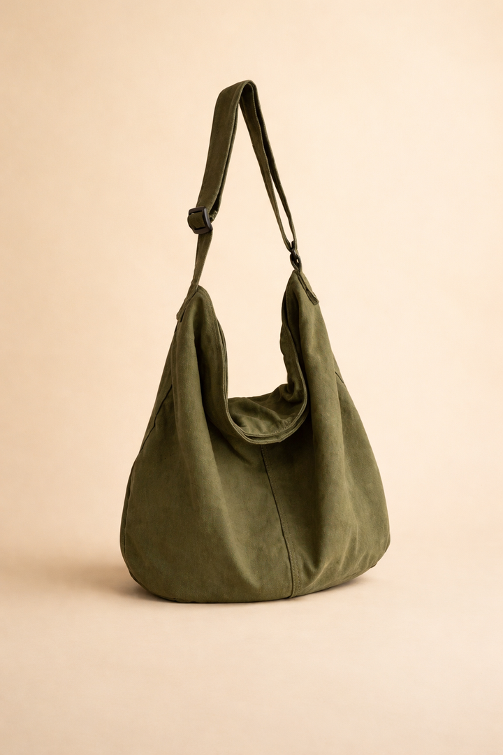 Unisex minimalistyczna torba miejska na ramię w kolorze czarnym. Idealna do codziennego użytku.