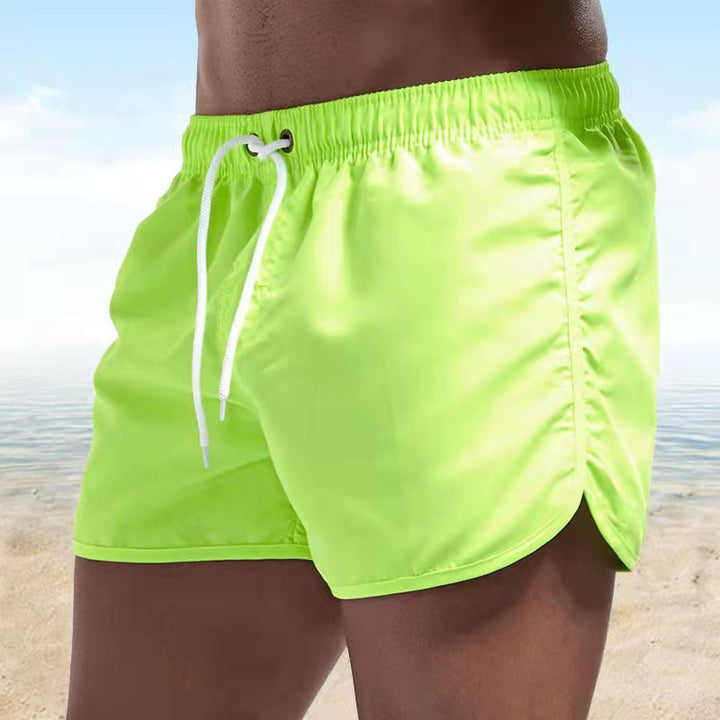 Wygodne męskie szorty kąpielowe w stylu casual, szybkoschnące, idealne na plażę i lato.