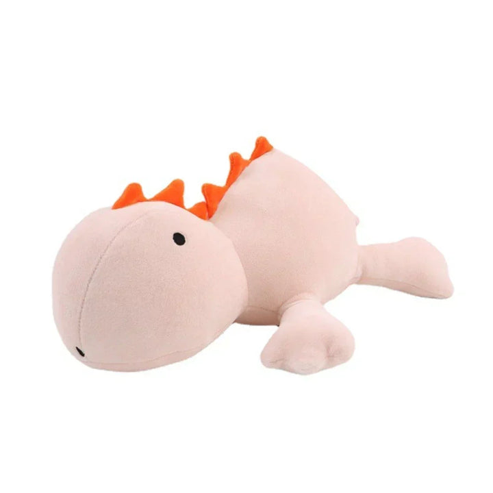 Dziecko przytula dużego ważonego dinozaura CuddleSaurus, czerpiąc komfort i spokój.