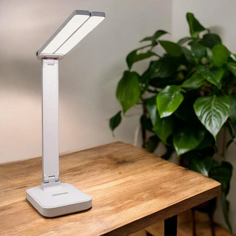 Elegancka różowa składana lampa LED z dotykiem, doskonała jako lampka biurkowa lub do czytania.