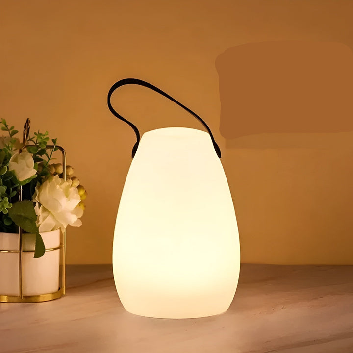 Lampa LED Lumora zmieniająca kolory, bezprzewodowa i wodoodporna. Stwórz nastrojowe oświetlenie w domu.